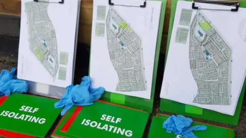 Kings Park Village Kings Park Village red and green card scheme