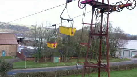 Aerial ropeway going over a road