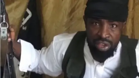 AFP A screengrab taken on 24 March 2014 from a video obtained by AFP showing Boko Haram leader Abubakar Shekau