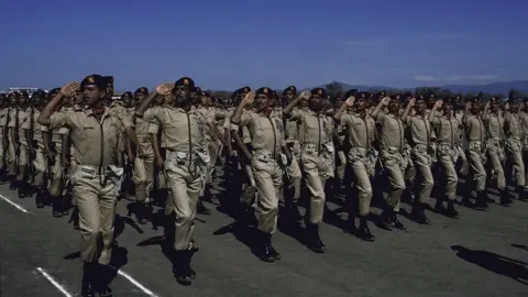 Getty Images Ceremonial troops saluting during Pakistan National Day military parad