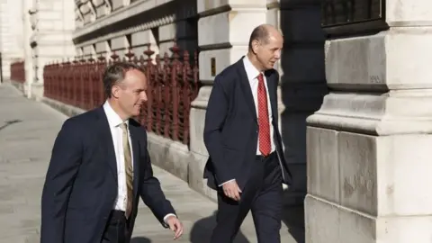 PA Media Dominic Raab and Philip Barton