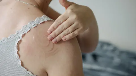 Getty Images A woman using hormone treatment