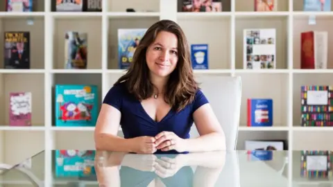 Laura Gallant  Dr Rachel Clarke sitting in her study