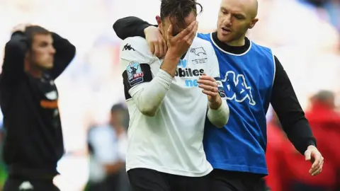 Getty Images Richard Keogh in tears