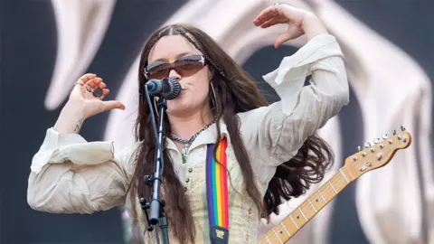 Getty Images Wet Leg's Rhian Teasdale performing at Big Weekend