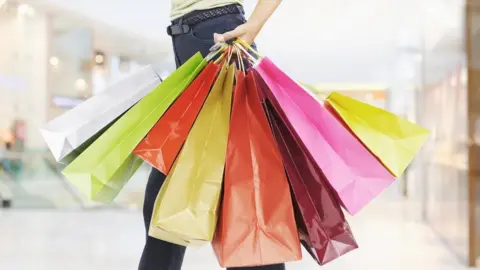 Daly and Newton/Getty shopping bags