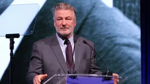 Getty Images Alec Baldwin giving a speech
