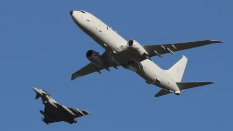 PA Media P-8A Poseidon being escorted by RAF Typhoons
