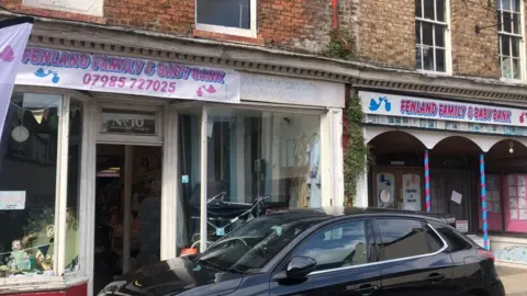 John Devine/BBC Baby bank shops in Wisbech