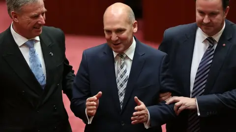 Getty Images Stephen Parry (centre) being elected president of the Senate in 2014