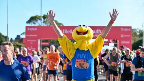 Great South Run man in Sesame Street costume runs