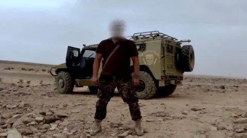 BBC An image said to be of a Wagner fighter in Libya, posted on a Telegram channel in March 2021