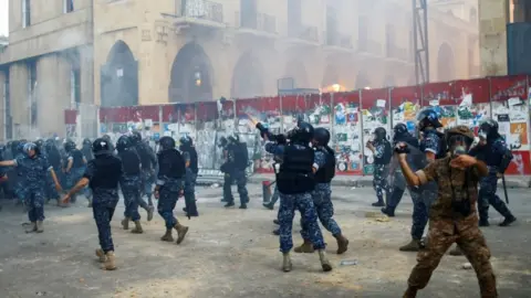 Reuters Riot police fired weapons during anti-government protests in Beirut