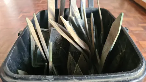 Stuart Woodward / BBC Memorial plaques from Woodside Cemetery in Benfleet in a storage container