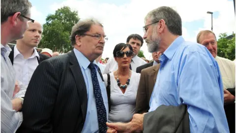 Pacemaker John Hume with Gerry Adams during a march in Derry before the release of the findings of the Saville Inquiry into Bloody Sunday