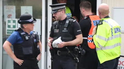 EDDIE MITCHELL Police at Worthing