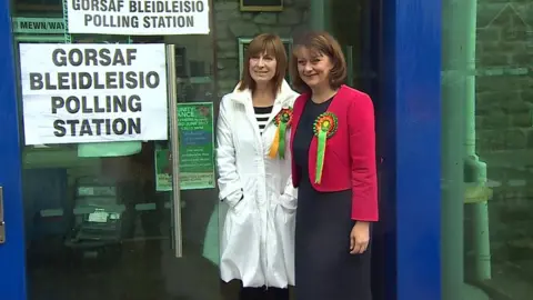 Leanne Wood (right) goes to vote in Penygraig, Tonypandy, Rhondda