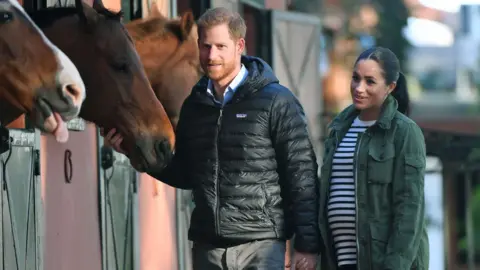 AFP/Getty Images Prince Harry and Meghan