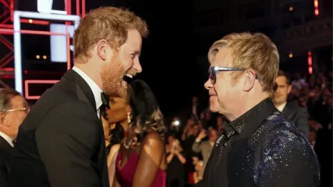 Reuters Prince Harry and Elton John