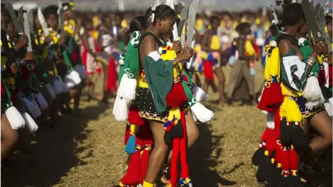 Christian Science Monitor Tens of thousands of maidens, dressed in traditional garb, perform the reed dance for the king during the Umhlanga festival