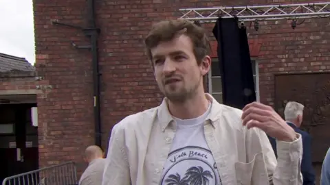 Fin Reeves, brother of band member River at the memorial