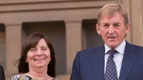 Getty Images Margaret Aspinall and Sir Kenny Dalglish