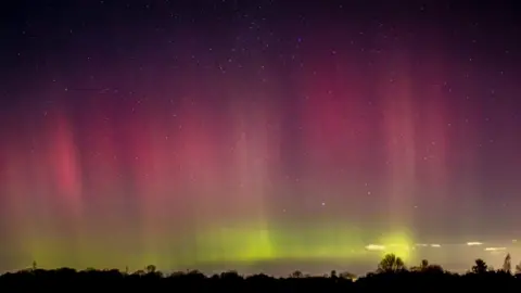 BBC WEATHER WATCHER / SHIRLEY YOU CANT BE CIRRUS One BBC weather watcher captured the strong pink and purple hues covering the Norfolk sky