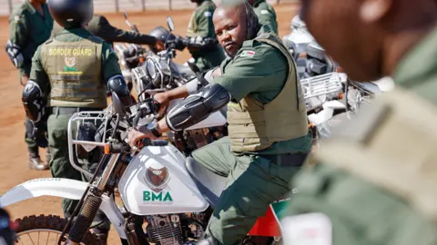 AFP South African Border Management Authority (BMA) officers gather with their motorcycles ahead of the launch of their force at the Musina Show Grounds in Musina, South Africa - 5 October 2023