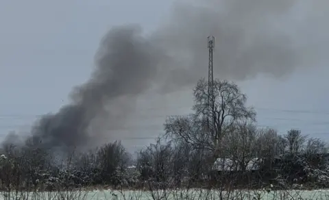 Julie Byrne Smoke from the site