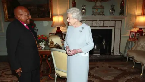 Getty Images Desmond Tutu with the Queen