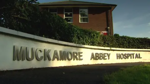 BBC A sign outside Muckamore Abbey Hospital