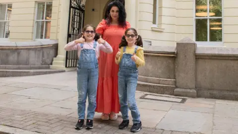 Ash Knotek/GOSH/PA Wire Judith, Iona and Beth Farshi