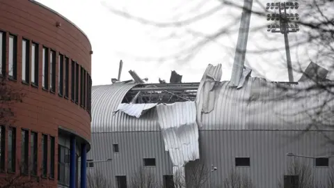 EPA The damaged roof of ADO Den Haag's football stadium