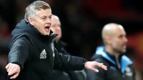 Manchester United manager issues instructions to his players from the touchline during their EFL Cup final semi-final first-leg defeat by Manchester City