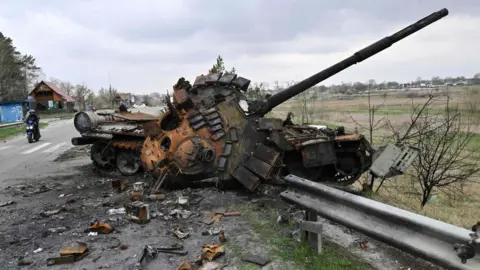 Getty Images A destroyed Russian tank on 16 April