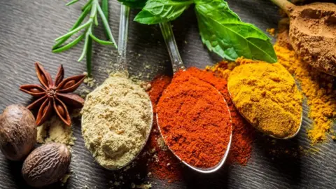 Getty Images Spices displayed on spoons