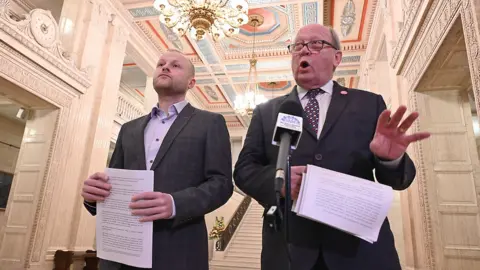 PAcemaker Jim Allister and Jamie Bryson in Stormont