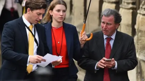 AFP Sir Oliver Letwin and parliamentary aides