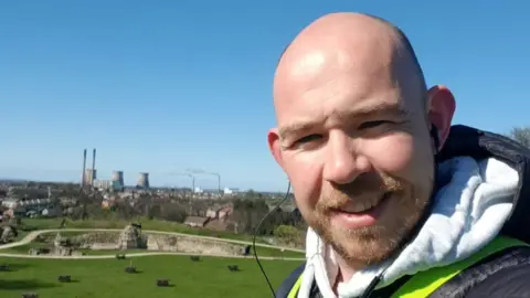 Ciaran Hannington man pictured outside