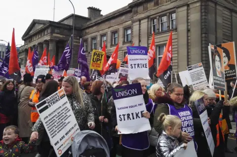 Strikers march to George Square