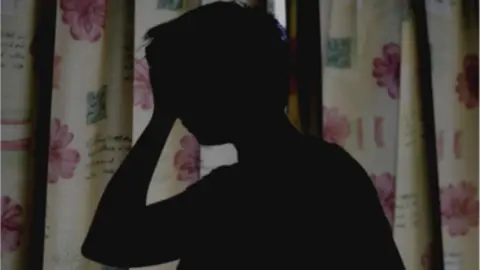 PA Media Library image of a woman in silhouette