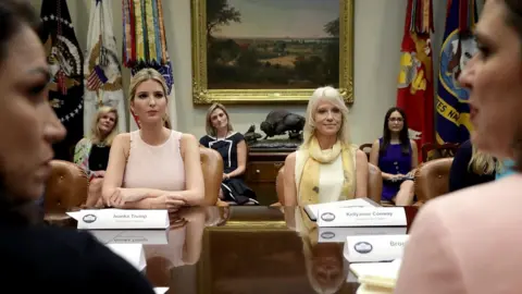 Getty Images Ivanka Trump (L) and White House aide Kellyanne Conway appear in Washington in August.