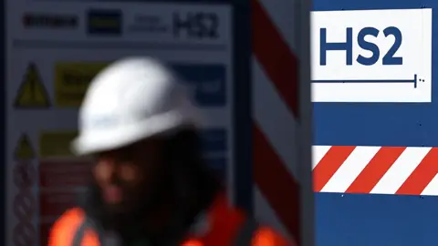 AFP Hs2 sign with construction worker in foreground
