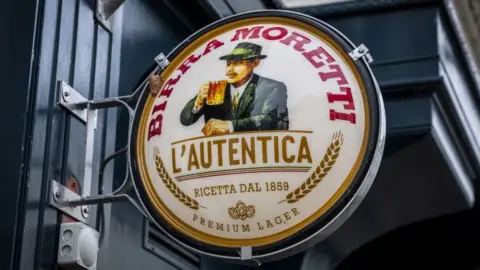 A sign for Birra Moretti