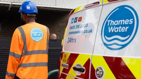 Getty Images Thames Water worker and van