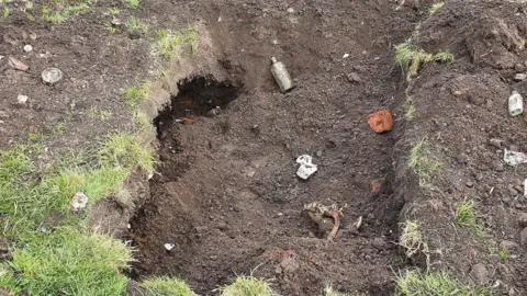 Freemen of Newcastle Debris in hole