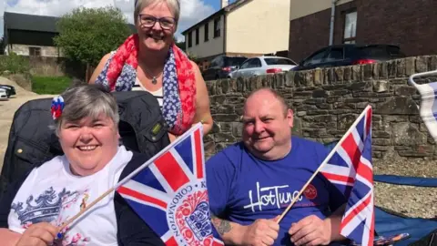 The village was awash with colour during the Coronation service