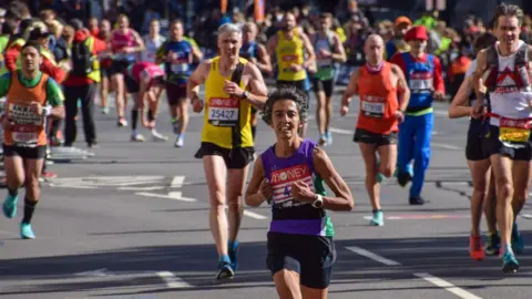 Getty Images Marathon runners in 2021