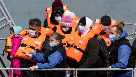 Getty Images Migrants arrive at Dover port