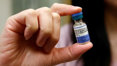 Reuters Generic image of vial of the measles, mumps, and rubella vaccine (MMR)